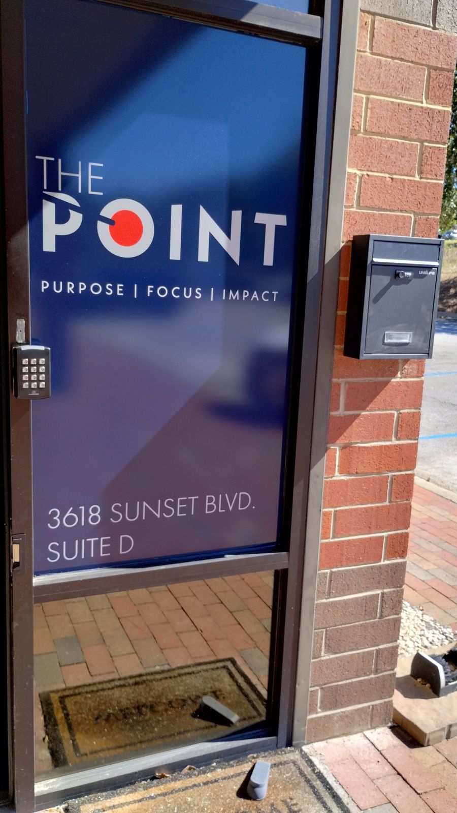 Entrance door to The Point podcast studio, 3618 Sunset Blvd Suite D